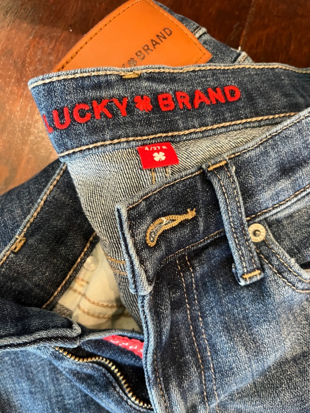 Lucky Brand Dark Blue Denim Jeans with Red Logo Accents